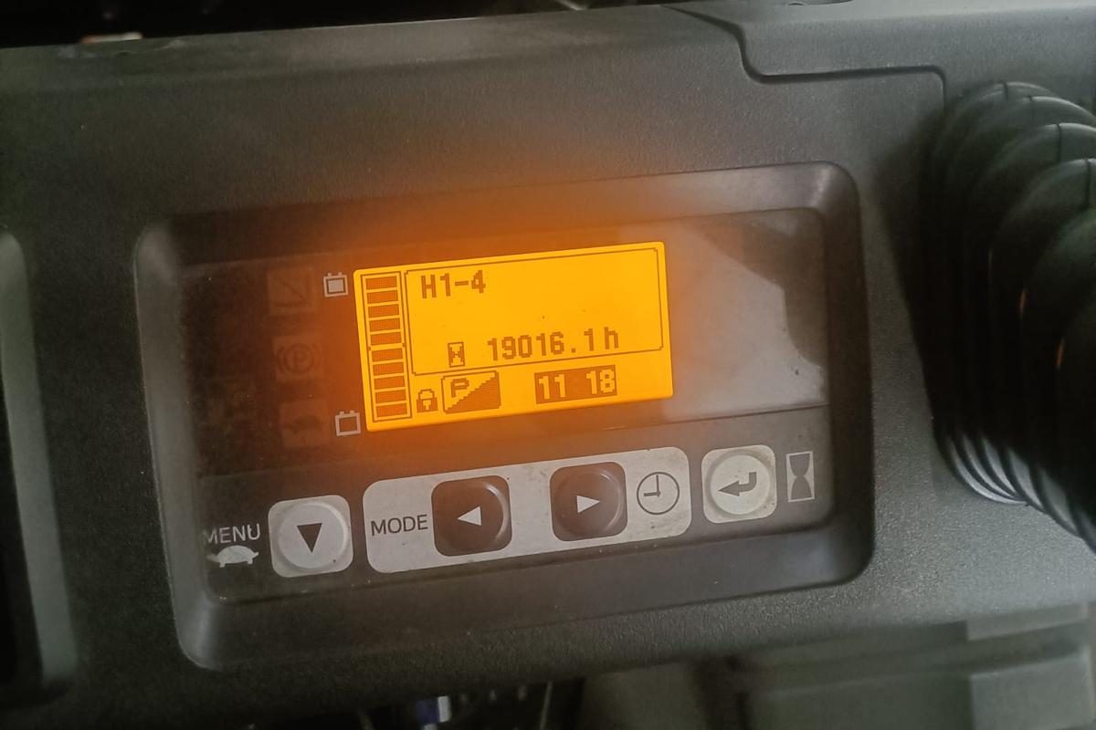 A forklift display showing code H1-4 and an hour meter reading of 19,016.1 hours, photographed on a job in Singapore